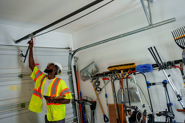 Professional Garage Door Roller Replacement technician working in Elwood, KS
